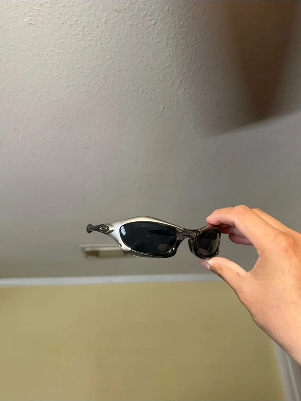 Sporty Women’s Silver Frame Black Lens Sunglasses Oakley